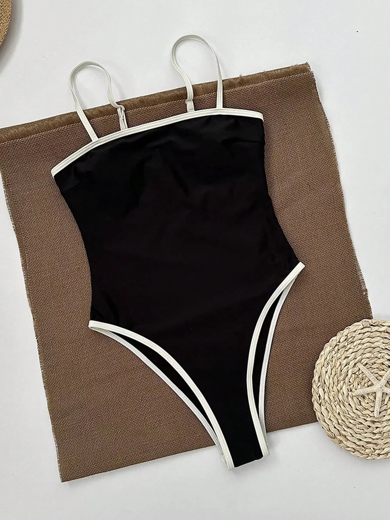 One-Piece Swimsuit in Black with High-Leg Cut and Contrast Detail